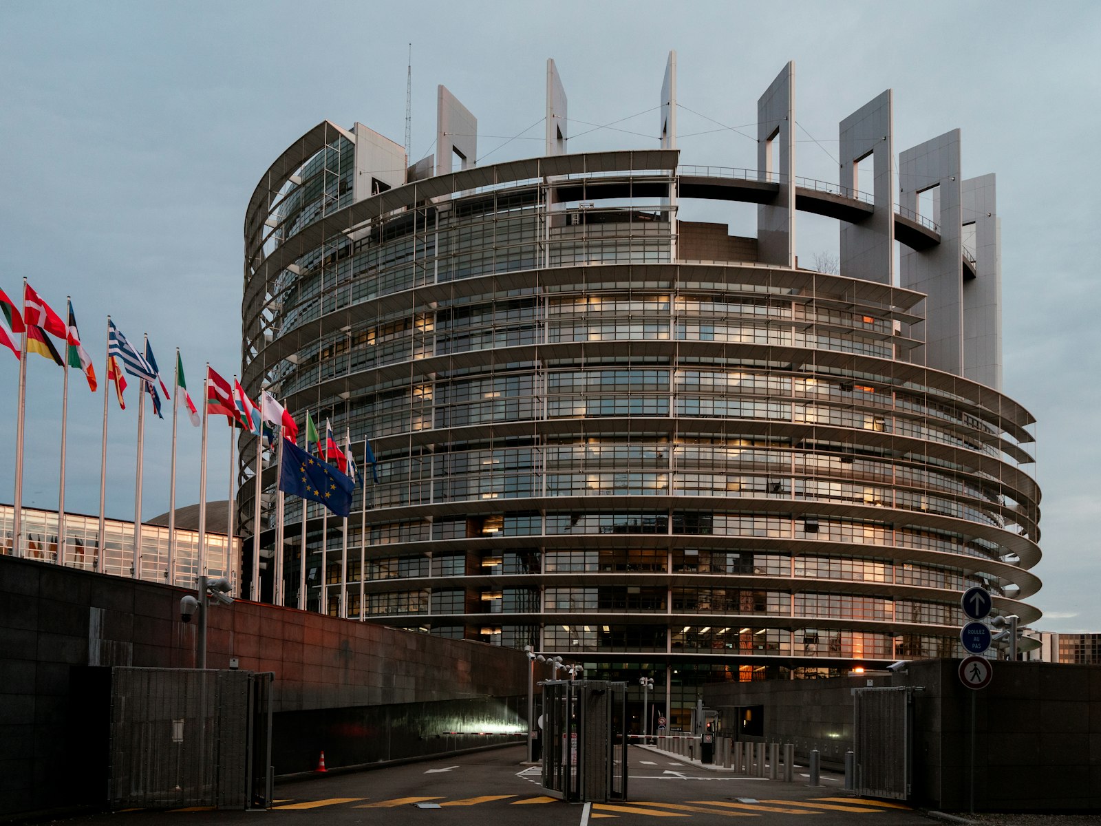 Current issue cover featuring European Parliament building with digital overlay representing modern diplomatic relations